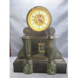 A Victorian black and green marble mantle clock with visible brocot escapement and mercury
