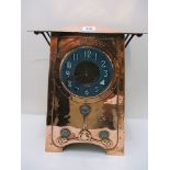 Circa 1905 an Arts and Crafts copper clock in the style of Archibald Knox for Liberty having