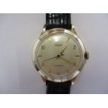 A 1950s 9ct gold gents Tissot automatic wristwatch with champagne dial, Arabic and baton numerals,