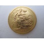 A gold sovereign with St George on the obverse, 1966, cased