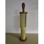 A mahogany finished Fullers Spiral Slide Rule with a turned handle, unboxed