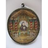 An early to mid 19th century religious reliquary of a saint, central oval miniature painting of a