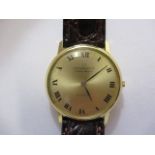 A gents slim 18ct gold, circa 1966 Universal Genève, Golden Shadow automatic wristwatch. The
