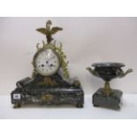 A 19th French century ormolu and green marble drum head clock, sitting on a green marble base,