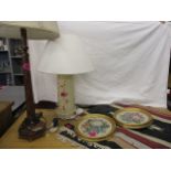 Table lamps and two Turkish scatter cushions, and two circular mounted needlepoint pictures of