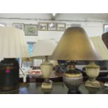 A collection of table lamps and shades to include a lamp with a green coloured body and gilded