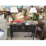 A black lacquered, oriental style console table, 33 x 395 x 10, together with a pair of gilt table