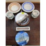 A selection of Poole Pottery to include ash trays, a plate and other items