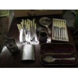 A mixed lot of silver and silver plate to include cutlery, a mirror, a berry spoon and other items