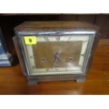 An Enfield, oak cased mantle clock, striking on Westminster chimes, circa 1930, 9 high, A/F