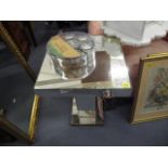 A mirrored glass pedestal occasional table and a pale blue painted standard lamp