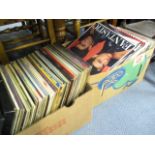 A collection of mainly 1980s LPs to include Elton John Yellow Brick Road, and various singles from