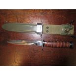 A USA M8A1 American combat knife in a metal sheath, length of blade 6 3/8