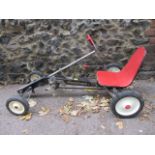 A Raleigh Panther go-kart in red