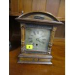 An early 20th century HAC Wurttemberg German, walnut cased 8 day mantle clock with a silvered