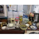 A large mixed lot to include a doll, prints, a decanter, a sat nav, books, mixed china and other