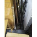 A mixed lot of vintage garden tools and step ladders