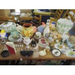 A mixed lot to include piggy banks, china gnomes, a Rosenthal plaque, Portmerion, an Oriental tea