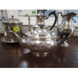 A group of silver plated items to include a Victorian biscuit barrel with ferns and crane engraved