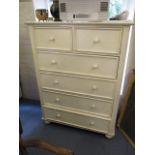 A cream painted chest of two short and three long drawers, 54 h x 40 w x 21 d