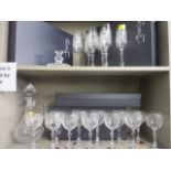 A French crystal decanter with twelve matching wine glasses and six Champagne glasses, boxed