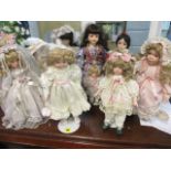 A collection of modern porcelain dolls