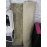 A modern cream wool rug, 74 x 47