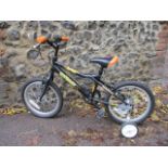 A child's Dwest Fusion bike with stabilizers