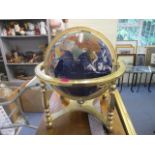 A large terrestrial globe on brass stand, 17 dia