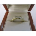 A 9ct gold half-eternity ring