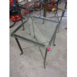 A modern wrought steel glass topped square table, 23 3/4h x 23 3/4 w