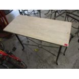 A modern wrought iron steel, marble topped rectangular table, 29 h, 35 1/2 w