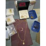 A small selection of gold jewellery to include an 18ct gold ring set with blue and white gem stones,