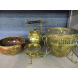 A Victorian brass spirit kettle with embossed decoration, a brass planter and a Royal Doulton