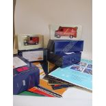 Four boxed Corgi cars to include a model T Ford and miscellaneous Add cards from the Post Office