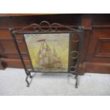 An Arts & Crafts inspired, wrought iron and tapestry fire screen, 30 h x 23 w