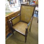 A modern mahogany Brights of Nettlebed, cane seated armchair