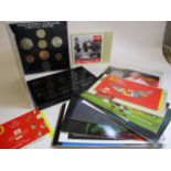 Three packets of coins to include un-circulated 1983 coins and thirteen Royal Mail stamp books