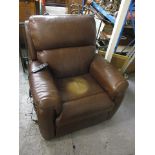 A leather electric, reclining chair in brown