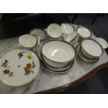 A Royal Doulton Regalia part dinner service with white ground and a blue, green and gilt deco