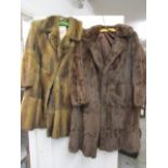 A mink fur coat, together with a squirrel fur coat