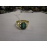 An 18ct yellow gold, ring set with emeralds and diamonds