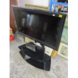 A Sony Bravia 37 TV on a stand