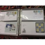 An album of approximately fifty six first day covers, mainly commemorative