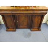 A mid 19th century mahogany dresser with a cushion moulded drawer above a knee hole cupboard door,
