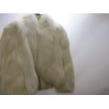 An arctic fox fur bolero jacket