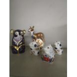 A group of five Royal Crown Derby paperweight animals to include a Kola bear, a Collectors Guild