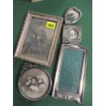 Five Victorian and later silver hallmarked photo frames