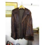 A musquash jacket in two tone brown colourway, approximately 31 in length and 44 chest width