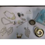 Silver jewellery to include chain bracelets, two hat pins and a silver ring with green hard stone